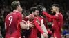 Bruno Fernandes (centre) celebrates with his Manchester United team-mates (Nick Potts/PA)