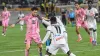 Inter Miami forward Lionel Messi, left, attempts to keep the ball from Christopher Ainsworth of Jamaica’s Cavalier (AP/Colli