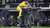 Guglielmo Vicario jumps on Tottenham boss Ange Postecoglou and his coaching staff at full-time after a 1-0 win over Eintrach