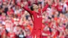 Liverpool’s Virgil van Dijk celebrates a 5-1 victory over Tottenham to secure the Premier League title (Peter Byrne/PA)