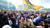 Leeds fans celebrate promotion to the Premier League outside Elland Road (Mike Egerton/PA).