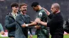Ange Postecoglou (right), Dominic Solanke (centre) and James Maddison celebrate after the final whistle (Bradley Collyer/PA)